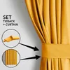 A close-up of a yellow curtain with a tieback, showing how it is used. Produktbild-Vorschau