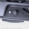 A close-up view of the control panel of a lawnmower, showing the start/stop switch and an electric start button. Produktbild-Vorschau