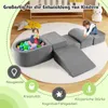 Children playing with soft foam blocks and a ball pit indoors. Anteprima dell’immagine prodotto