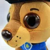 Close-up of a plush toy dog's face. Voir les images du produit
