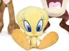 A close-up shot of a Tweety Bird plush toy sitting on a white background, with parts of other plush toys visible behind it. Náhľad obrázku produktu
