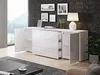 A modern living room with a white sideboard, artwork on the wall, and a lamp. Náhled obrázku produktu