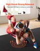 Two men wrestling on a black mat in a gym setting. Podgląd zdjęcia produktu
