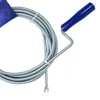 A coiled drain snake with a blue handle against a white background. Produktbild-Vorschau