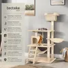 A beige cat tree with multiple levels, platforms, a hammock, and a scratching post, with two cats interacting with it. A descriptive text panel is on the left side of the image. Náhled obrázku produktu