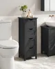 A black storage cabinet with four drawers is shown in a bathroom next to a toilet and sink.