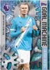 A trading card featuring a soccer player, Erling Haaland, in his team's uniform, with a background of gears and text. Podgląd zdjęcia produktu