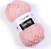 A ball of pink yarn with a label. Náhled obrázku produktu