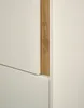 A close-up view of a white cabinet with a wooden accent strip. Produktbild-Vorschau
