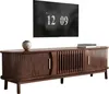 A brown TV stand with a television mounted above it. Produktbild-Vorschau