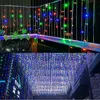 A collage of two images showing string lights, one with red, green, and blue lights on a balcony railing, and another with many blue and white lights hanging. Produktbild-Vorschau