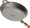 The underside of a cast iron frying pan with a wooden handle is shown, angled upwards against a white background. Produktbild-Vorschau
