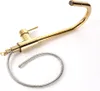 A gold kitchen faucet with a flexible hose, shown against a white background. Produktbild-Vorschau
