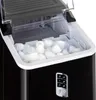 A close-up view of the top section of a black ice cube maker, with the lid open and filled with ice cubes. Produktbild-Vorschau