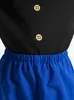 Close-up of a child's costume showing the top part of a blue skirt with an elastic waistband and the bottom part of a black top with two gold buttons. Produktbild-Vorschau