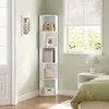 A white corner shelf unit filled with decorative items and books, placed in a room next to a window and a bed. Produktbild-Vorschau
