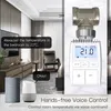 A bedroom scene with a smart thermostat and voice assistants, demonstrating voice control for temperature. Podgląd zdjęcia produktu