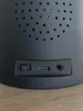 A close-up view of the ports and switch on the back of a black speaker. Anteprima dell’immagine prodotto