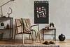 A modern living room setting with a chair, a side table, and a wall-mounted magnetic board. Anteprima dell’immagine prodotto