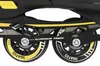 A close-up view of the wheels and frame of a pair of inline skates. Voir les images du produit