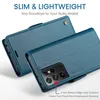 A teal leather wallet-style phone case is shown, with one part open to reveal the phone's camera module. Text overlays highlight features. Produktbild-Vorschau