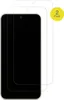 Two screen protectors are shown layered on top of each other, with the top one slightly offset to reveal the edge of the one beneath it. A smartphone is partially visible beneath the screen protectors, showing its top edge with a camera cutout. Podgląd zdjęcia produktu