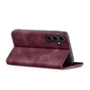 A burgundy flip case for a smartphone is shown in a studio setting against a white background. Produktbild-Vorschau