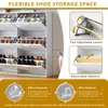 A white shoe cabinet with multiple shelves and doors, showcasing different shoe storage configurations and features. Anteprima dell’immagine prodotto
