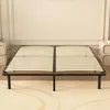 A bed frame with wooden slats on a carpeted floor. Voir les images du produit