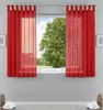 A window with red sheer curtains, showing a green tree and blue sky outside. Produktbild-Vorschau