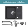 A black granite kitchen sink with its accompanying plumbing accessories. Produktbild-Vorschau