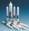 A collection of white candles with cartoon illustrations, arranged on a blue background. Anteprima dell’immagine prodotto