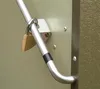 A close-up view of a metal storage box with a padlock securing a handle. Náhľad obrázku produktu