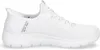 A side view of a white Skechers slip-on sneaker. Produktbild-Vorschau