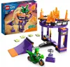 A LEGO City Stuntz set featuring a stunt motorcycle, ramps, and a circular track with flame elements, displayed alongside its product packaging. Produktbild-Vorschau