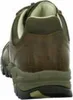 The back view of a brown leather shoe with a green sole. Voir les images du produit