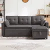 A gray sectional sofa with a pull-out bed and storage ottoman is shown in a living room setting. Podgląd zdjęcia produktu