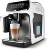 A white and silver Philips 3200 series coffee machine with a glass of latte on the drip tray. Produktbild-Vorschau