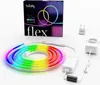 A product shot of a Twinkly Light Flex LED light strip, its packaging, and power adapter, displayed on a white background. Produktbild-Vorschau