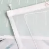 A close-up view of a transparent white curtain or blind with text printed on it, layered over a light green background with more text. Produktbild-Vorschau