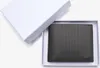 A black wallet is presented in a white gift box. Produktbild-Vorschau