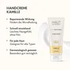 A tube of hand cream with text describing its benefits. Produktbild-Vorschau