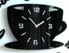 A black acrylic wall clock shaped like a coffee cup. Voir les images du produit