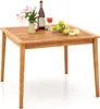 A wooden table with a bottle of wine, a glass of wine, flowers, and fruit. Anteprima dell’immagine prodotto