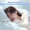 A woman is sleeping peacefully in bed with earbuds in her ears, with wavy lines suggesting sound or comfort. Produktbild-Vorschau