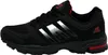 A side view of a black athletic shoe with red accents. Produktbild-Vorschau