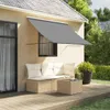 An awning is extended over an outdoor seating area with a sofa and coffee table on a wooden deck. Produktbild-Vorschau
