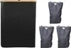 A black laundry hamper with a wooden lid and three gray laundry bags are displayed against a white background. Produktbild-Vorschau