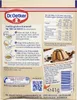 The image shows the back of a Dr. Oetker pudding powder package, detailing ingredients, nutritional information, and preparation instructions. Produktbild-Vorschau