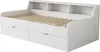 A white daybed with drawers and shelves is shown from a slightly elevated, diagonal angle against a white background. Náhled obrázku produktu